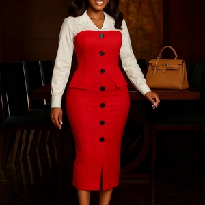 Detail of red and white panelled business dress with black buttons and waist pocket flaps