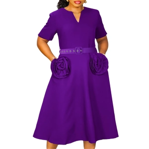 Detailed view of the purple V-neck dress featuring oversized 3D rose floral appliques on the skirt