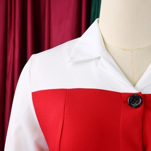 Detail of red and white contrast pencil dress showing crisp collar and black button
