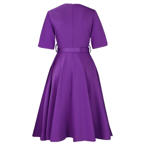 Detail view of the back showing invisible zipper and waist belt on purple dress