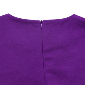 Detail view of deep purple textured fabric with a high-quality hidden back zipper