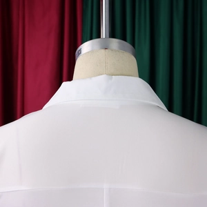 Detailed back view of white professional pencil dress with clean collar and yoke stitching
