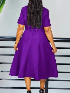 Elegant purple V-neck short sleeve A-line midi dress with waist belt, back view display
