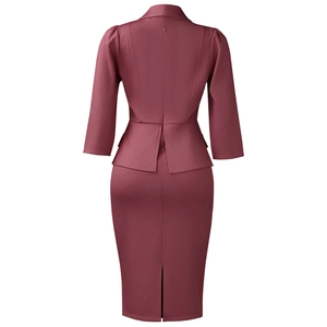 Rear view of dusty pink peplum suit jacket and pencil skirt with a back slit detail