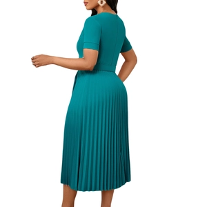Detailed view of elegant peacock blue pleated midi dress with short sleeves and waist belt