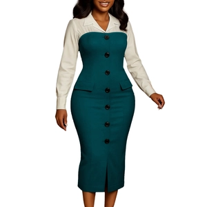 Detail of a color-block pencil dress with black buttons and a center front slit design