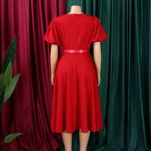 Detail view of red midi dress back with puff sleeves and matching waist belt