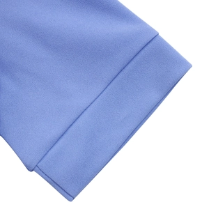 Detailed close-up of sky blue pleated fabric texture and high-density stitching quality