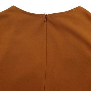 Close-up of caramel V-neck dress showing fine fabric texture and seamless back zipper