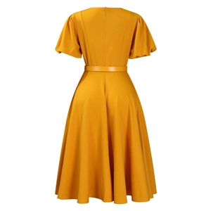 Detail of yellow A-line dress with back invisible zipper and matching waist belt