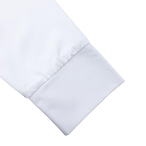 Detailed close-up of the double-stitched white long sleeve cuff with high-quality fabric texture