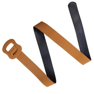 Detail of a brown suede belt with a square covered buckle and fine stitching