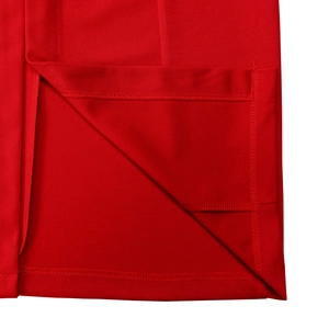 Detail of red pencil dress showing high-quality stitching and durable hemline finishing