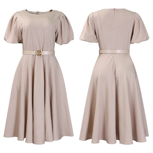 Detail of elegant beige A-line dress with puff sleeves and metallic buckle belt