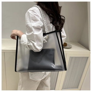 Chic iridescent tote bag with frosted PVC texture and black leather trim accents