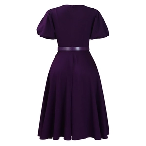 Back view of elegant purple A-line dress with puff sleeves and matching leather belt