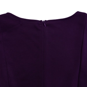 Close-up of deep purple dress featuring high-quality fabric and a hidden back zipper