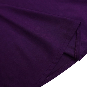 Close-up of deep purple fabric showing high-quality stitching and fine textile texture