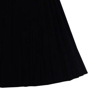 Detail view of high-quality black pleated fabric with vertical pleats and smooth texture