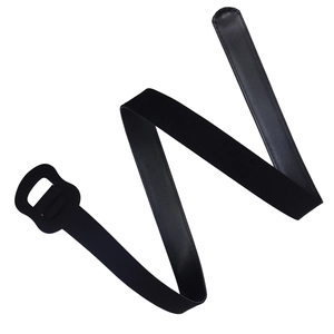 Detail shot of a minimalist black faux leather waist belt with a matte finish and round buckle