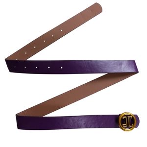 Close-up of dark purple leather belt featuring a round golden JC buckle on white background