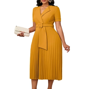 Detail of elegant mustard yellow pleated midi dress with V-neckline and waist belt