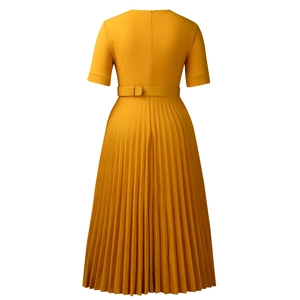 Detail view of the yellow pleated dress back with concealed zipper and matching belt