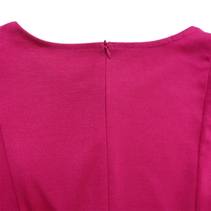Detail of the invisible back zipper and stitching on this fuchsia A-line dress