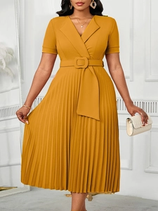 Elegant ginger yellow V-neck pleated midi dress with short sleeves and matching belt