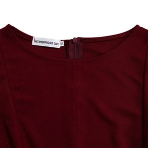 Detail of round neckline and invisible back zipper on wine red A-line dress