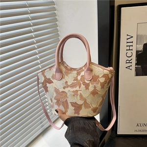 Floral print tote bag in cream white with pink leather handles and detachable strap