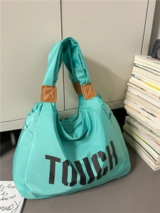 Borsa tote imbottita blu tiffany con scritta TOUCH e dettagli in pelle da donna