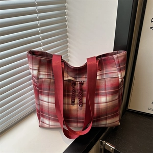 Large red and white plaid tote bag with wide straps and minimalist British style design