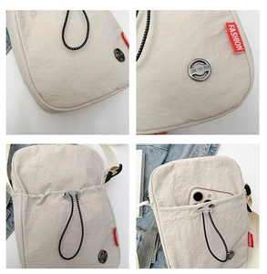 Détails du sac à bandoulière en nylon avec fermeture à cordon et écusson logo