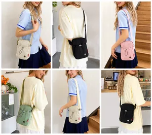 Mini sacs à bandoulière en nylon en quatre couleurs avec fermeture à cordon