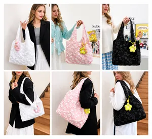 Detailed grid of textured floral tote bag with daisy charm in three elegant colors