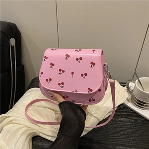 Sweet pink saddle bag with cherry print and adjustable strap for summer casual wear