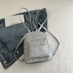 Mini metallic silver backpack in retro PU leather with vintage finish and zipper pocket