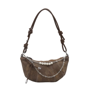 Brown vintage crescent bag with white stitching, pearl chain, and thick shoulder strap