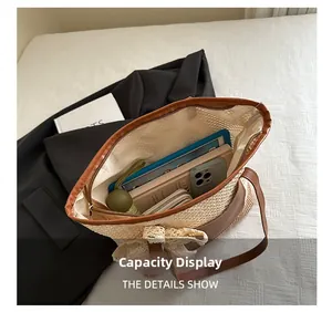 Spacious beige straw tote bag with brown leather trim showing ample interior storage space