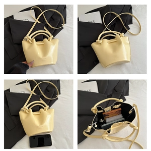 Detailed views of a cream bucket bag with drawstring closure and crossbody strap