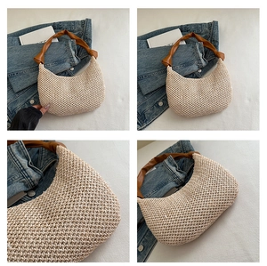 Detailansicht der elfenbeinfarbenen Hobo-Tasche mit stilvollem braunem Knotengriff aus Leder
