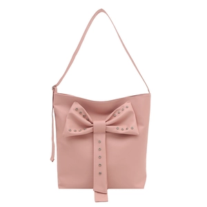 Pink faux leather bucket bag with rhinestone bow detail and elegant shoulder strap