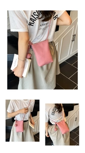 Dettaglio della borsa porta cellulare in pelle martellata rosa con tracolla a nodo alla moda