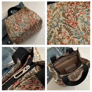 Detailed views of floral jacquard tote bag featuring metal zipper and black handles