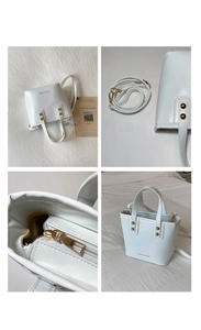 Detail shots of white PU leather mini bucket bag with gold hardware and strap