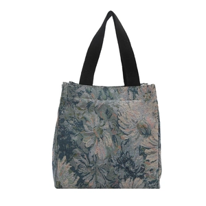 Blue floral jacquard tote bag with black webbing straps for casual spring commute