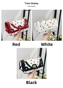 Detailed color display of cherry print crossbody bags in red, white, and black leather