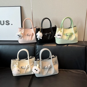 Woven PU Leather Bucket Bag For Women Fashionable Shoulder Crossbody Tote With Belt Buckle And Cute Plush Monster Pendant