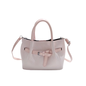 Chic beige pleated bucket bag with woven leather texture and metal buckle detail